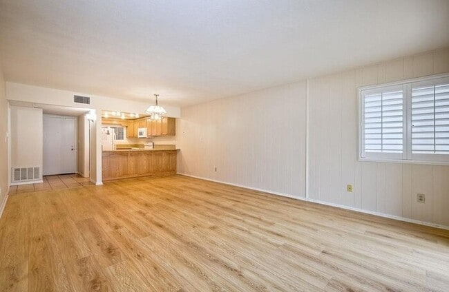 Building Photo - First-Floor 2BR Condo with Pool Access & Covered Parking in La Bonita Unit 107