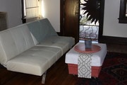 living room- futon - 3028 8th Ave Apartments Unit 3028
