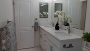 Ample bathroom featuring Quartz counter top, - 4727 W 147th St Unit 111