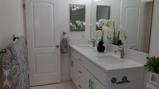 Ample bathroom featuring Quartz counter top, - 4727 W 147th St Unit 111