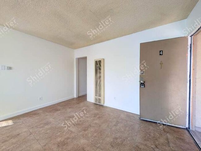 Photo - Upstairs 2 Bedroom 1 Bath with Massive Walk In Closet, Covered Gated Parking