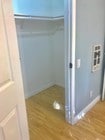 walk-in closet in small bedroom - 212 S Kraemer Blvd Condo Unit 2402