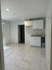Living room/kitchen - 720 Date St House