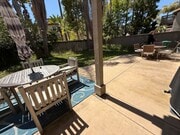 Photo - Gated 3 br townhome 2 garages fenced yard