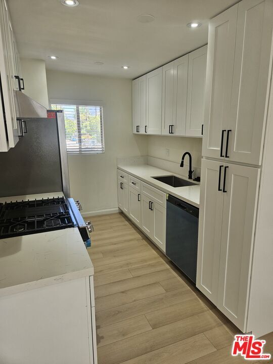 Building Photo - 10836 Camarillo St Unit 4