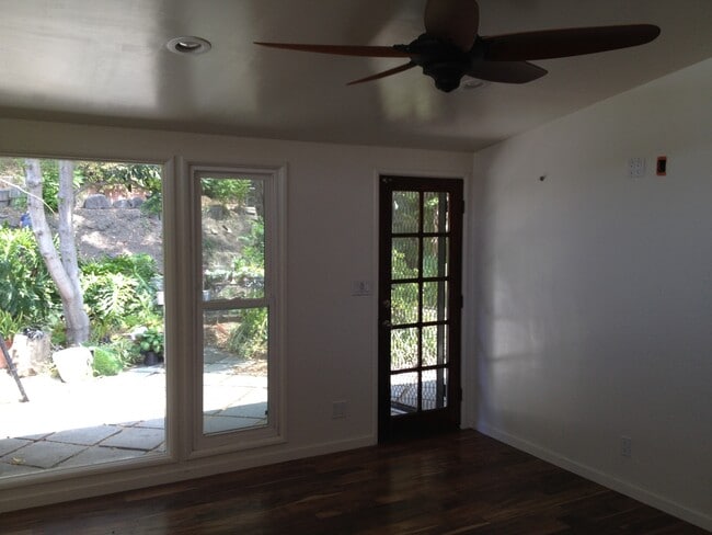 Entrance with view into garden - 3463 Mandeville Canyon Rd Townhome