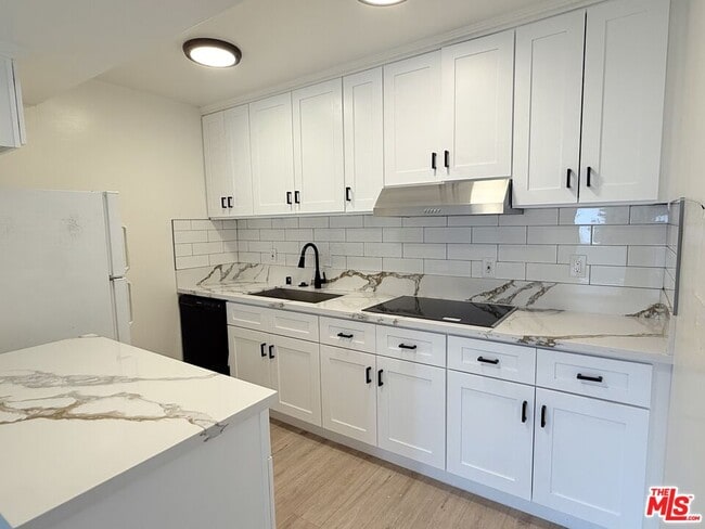 Photo - 10840 Camarillo St Townhome