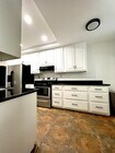 Kitchen entryway angle - 4201 Via Marisol Condo Unit 133