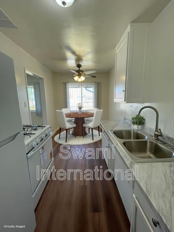 Building Photo - 2030 E Florence Ave Unit #6