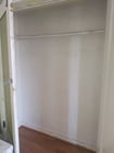 Living Room Closet - 2102 W 48th St Apartments