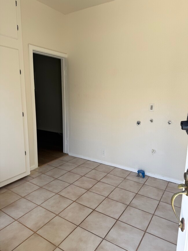 Kitchenette area looking at door to main room - 305 Emerald St Unit 305