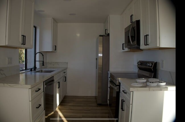 Building Photo - 2 Bedrooms 2 full baths corner condo in National City. Unit 18