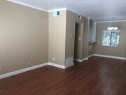 Photo - Beautiful 1 Bed/1 Bath Condo Apartment with Patio, Hardwood Flooring, Central AC, Washer and Drye...