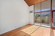 Living Room with Patio View - 271 S Church Ln Unit 271