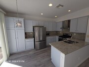 Photo - 11673 Compass Point Dr N Unit 11673 Compass Point Dr N,  3