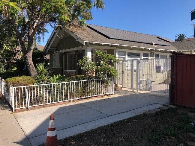 gate next to house, entrance to parking - 766 Temple Ave
