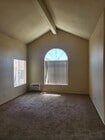 Living room with vaulted ceiling - 9502 Walker St Apartments Unit 4