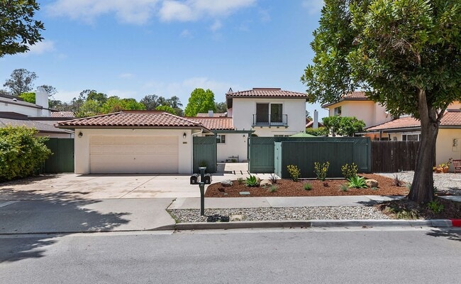 Building Photo - Beautifully redone Spanish duplex in peaceful and centrally-located Hidden Valley!