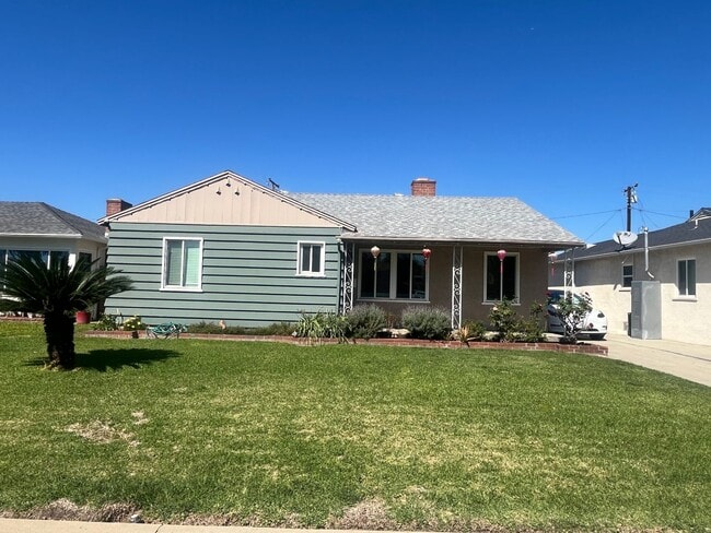 Photo - Home with a Cabin Style Family room and backyard Oasis