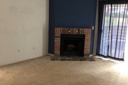 Fireplace in living room - 1730 S El Camino Real Unit 105