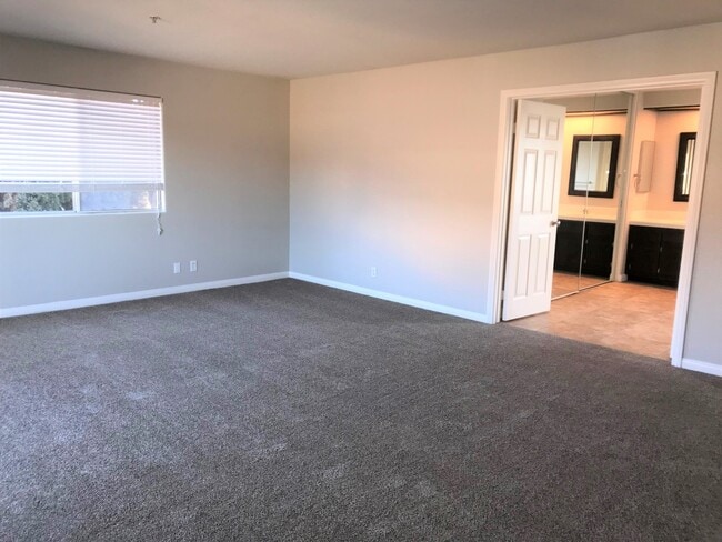 Photo - Vista home with a 2 car garage and additional parking