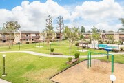 Open Green Space and Walking Paths - Village Meadows Apartments