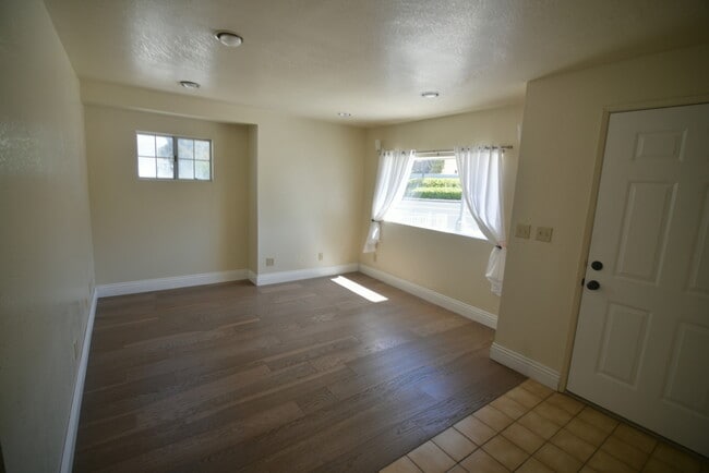 Living Room - Spacious for a couch, loveseat, TV - 111 N Pacific Coast Hwy Unit 111