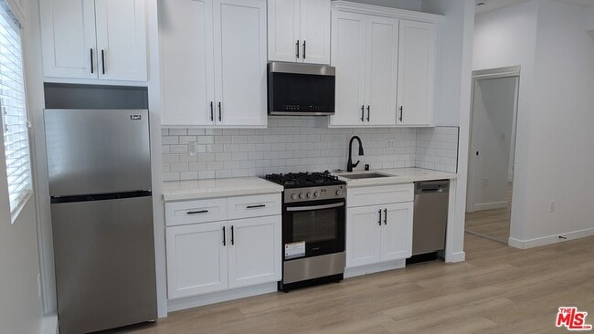 Photo - 1259 Devon Ave Unit 1261 3/4