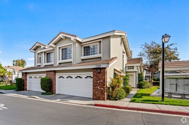 Building Photo - Two Story End Unit Townhome with Two Car G...