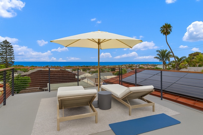 Roofdeck ready for sunbathing or evening sunsets. Virtually staged. - 4640 Del Monte Ave