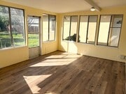 Photo - Spacious 3-Bedroom Home with Bonus Room, Bright Sunroom & Large Backyard