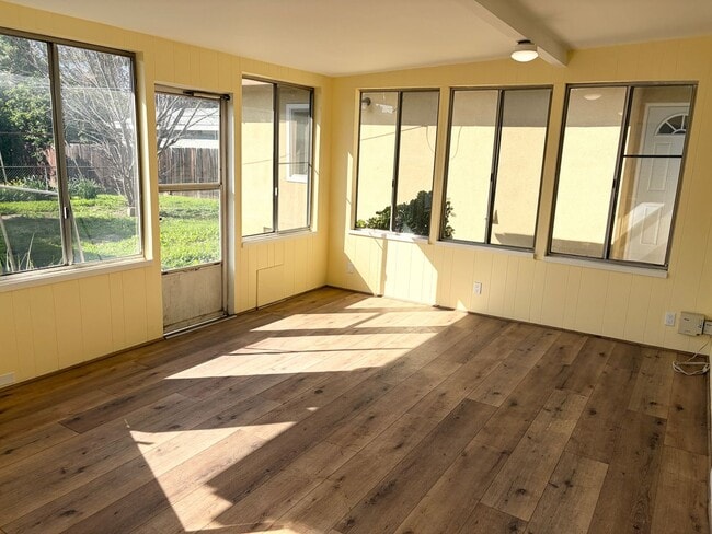 Photo - Spacious 3-Bedroom Home with Bonus Room, Bright Sunroom & Large Backyard