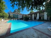 Photo - AVAILABLE NOW! 1BR w/patio, pool + spa, gym, parking + MORE!