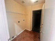 Laundry room and garage access - 1126 Latigo Cv Condo Unit #7