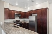 Granite Counters, Gas Range & Stainless Appliances - Turtle Creek Apartments