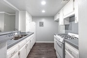 1BR, 1BA - 725SF - KITCHEN - The Mediterranean Apartments