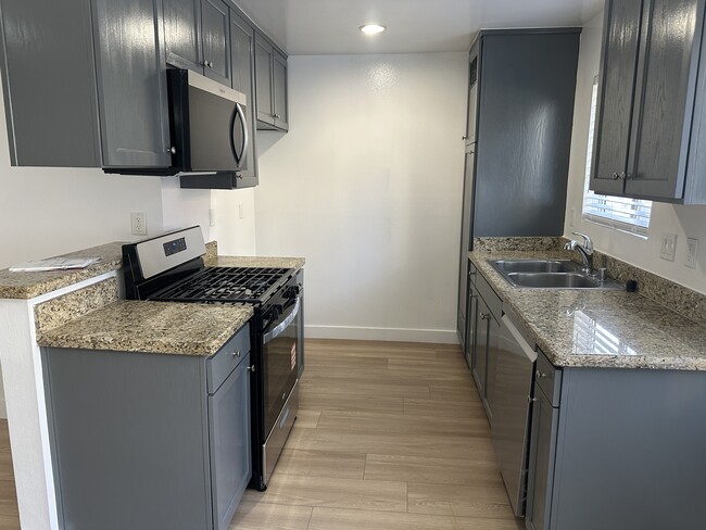 Building Photo - 8735 Variel Ave Unit 104