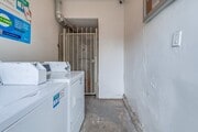Laundry on-site - 6611 S. Victoria Ave Apartments