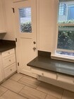 Backdoor in kitchen - 10662 Wilkins Ave Townhome