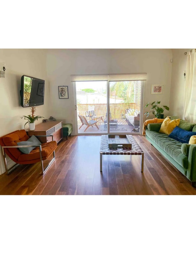 Living Room opens to deck - 1171 Hyperion Ave House