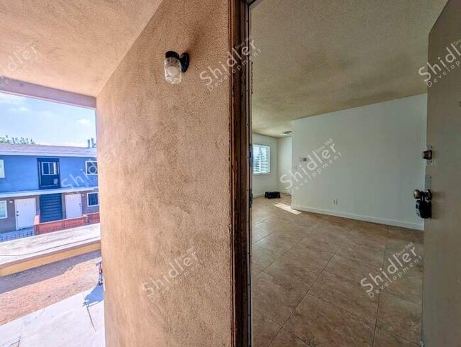 Photo - Upstairs 2 Bedroom 1 Bath with Massive Walk In Closet, Covered Gated Parking