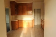 Kitchen view from back entrance - 6561 S Victoria Ave Apartment Unit 6561