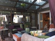 Lounge area under glass off kitche - 1136 8th St House