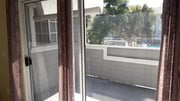 large balcony overlooking pool - 3500 S Greenville St Condo Unit A12