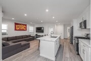 5BR, 3BA - 1,816SF - Living Room - The Hive On Ellendale USC Student Housing Apartments