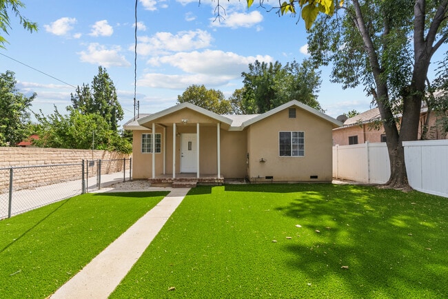 Building Photo - 6906 Alabama Ave Unit 1