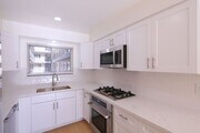 Photo - IN-UNIT LAUNDRY WITH ON-SITE PARKING!! Unit 104