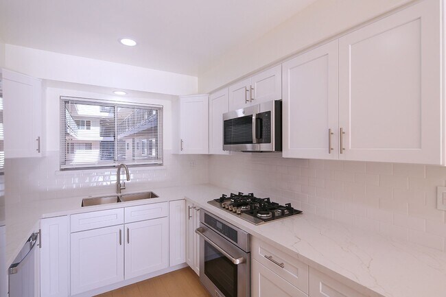 Photo - IN-UNIT LAUNDRY WITH ON-SITE PARKING!! Unit 104