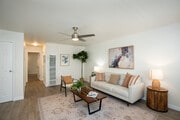 Living Room 2BD 2BA Unit 1 - The Grand at Vista Village Apartments