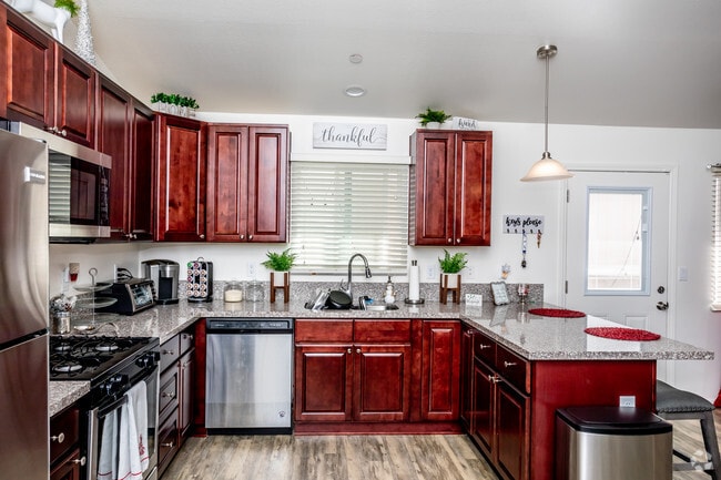 2BR, 2BA - 1074 SF - West Main Villas